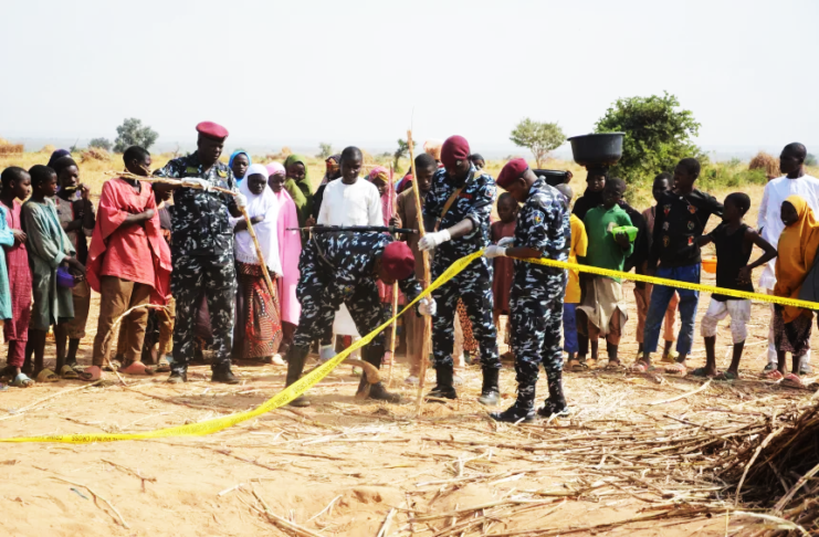 Nigeria police, Anti-Bomb squad, secure the scene of a U.S. airstrike in Northwest, Jabo, Nigeria